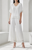 Witte viscose set met gehaakte details_