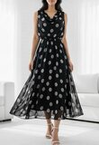 Zwarte midi jurk met stippen en watervalhals_