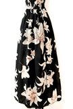 Trendy en chique armloze maxi halterjurk in zwart-wit_