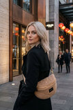 Champagne teddy crossbody tas met gouden details_