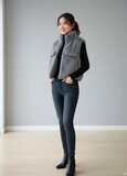 Grijze bodywarmer in teddy fleece_