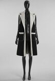 Luxe zwarte midi bodywarmer met teddy afwerking_