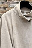 Beige cape jas met elegante ceintuur_