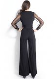 Jumpsuit met doorzichtige ballon mouwen._