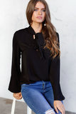 Trendy blouse in crêpe._