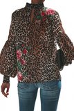 Blouse chic met leopardprint._