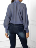 Blauw-grijze vintage blouse._