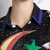 Flashy blouse met print van maan en sterren._