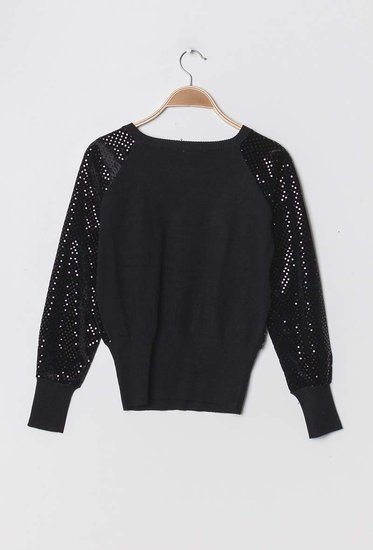 Trendy zwarte trui met pailletten.