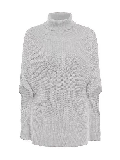 Trui in capevorm in verschillende kleuren.