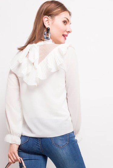 Trendy witte blouse in plissé.