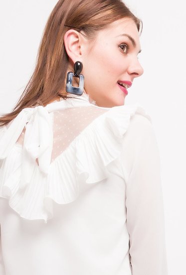 Trendy witte blouse in plissé.