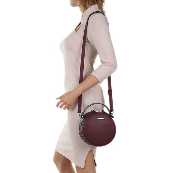 Trendy bordeaux ronde schoudertas.