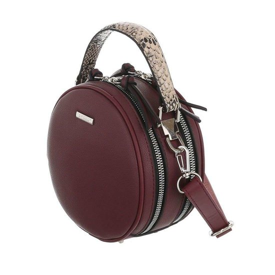 Trendy bordeaux ronde schoudertas.