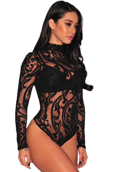 Zwarte bodytop met Maori tekens.