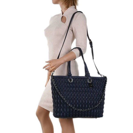 Trendy blauwe shopperbag met motief.