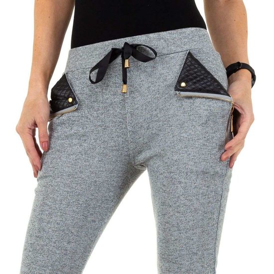 Fashion licht grijze broek met detail.