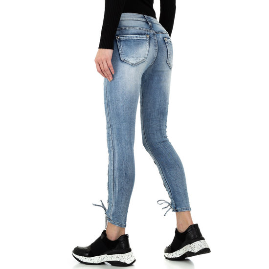 Fashion skinny jeans met veters.