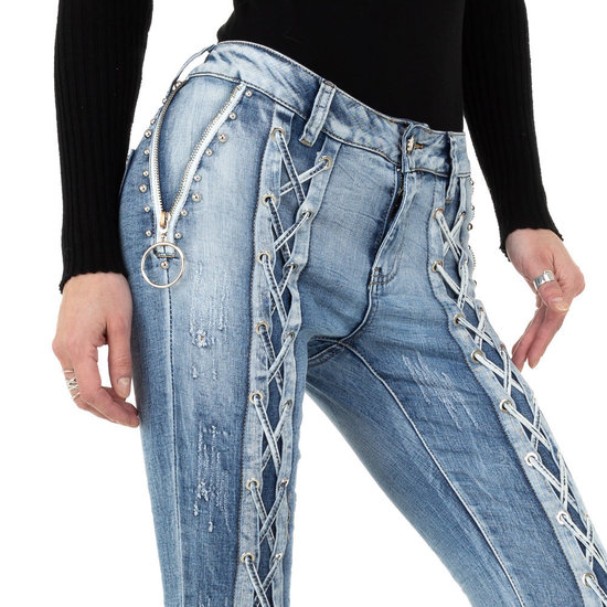 Fashion skinny jeans met veters.