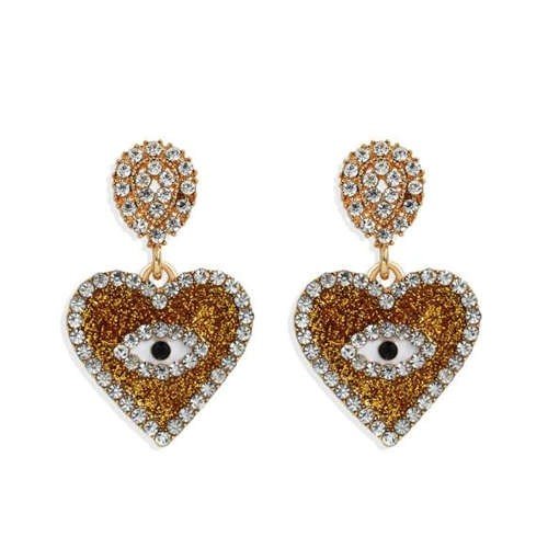 Gele oorbellen in hartvorm met oog en strass.