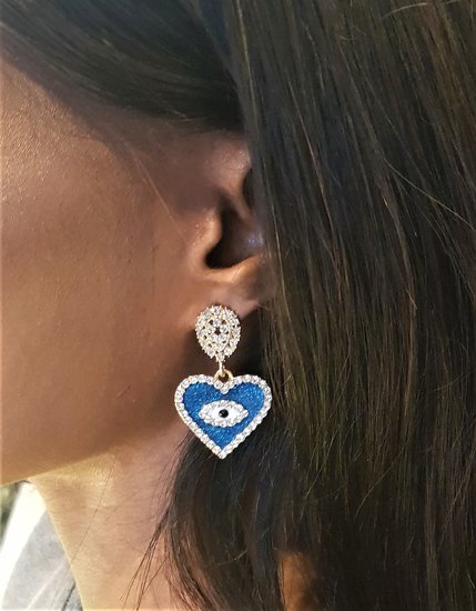 Blauwe oorbellen in hartvorm met oog en strass.