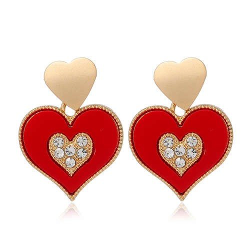 Classy rood/gouden oorbellen,hart in hart.