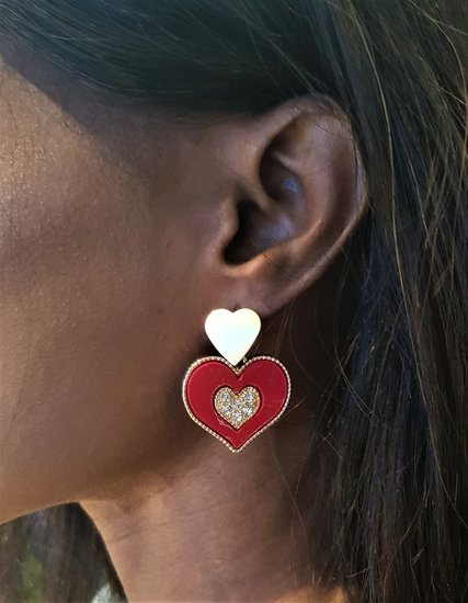 Classy rood/gouden oorbellen,hart in hart.