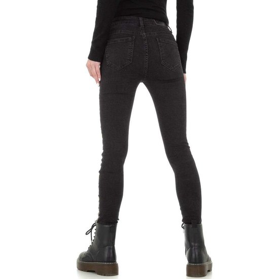 Zwarte skinny jeans met snake print deco lijn.