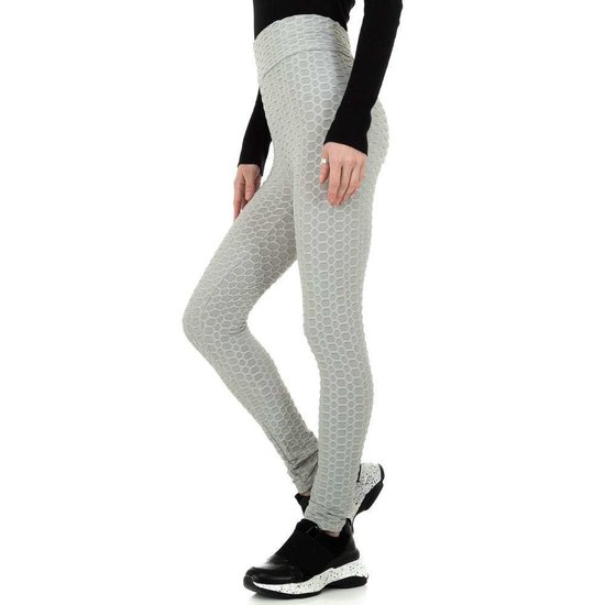 Sportieve grijze legging met struktuur.