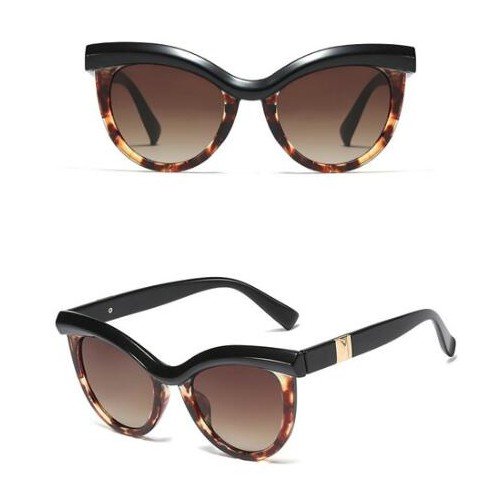 Trendy zwart-bruine zonnebril . Cat Eye style.