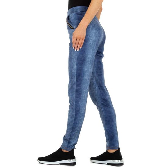 Trendy blauwe legging met zakken.