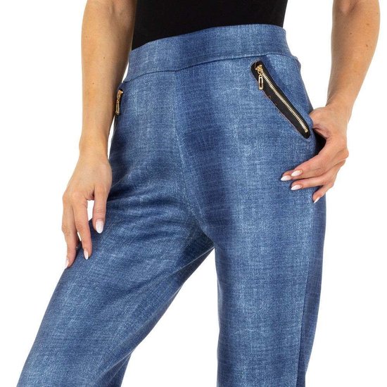 Trendy blauwe legging met zakken.