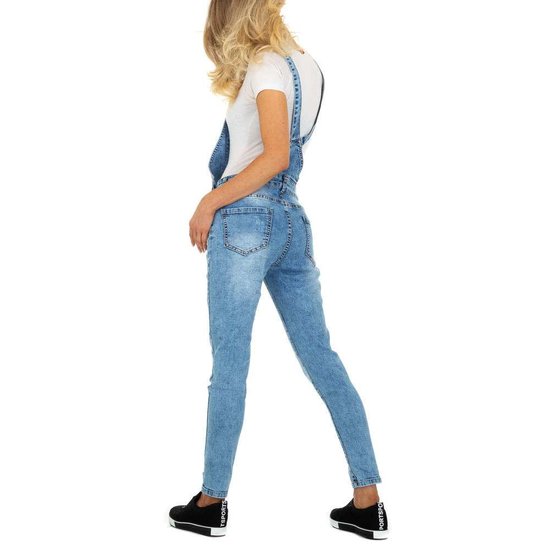 Trendy blue destroyed jeans salopet.