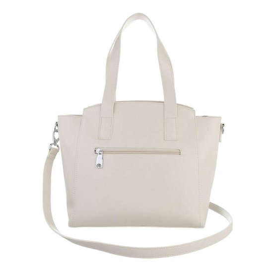 Middelgrote beige schoudertas met details.