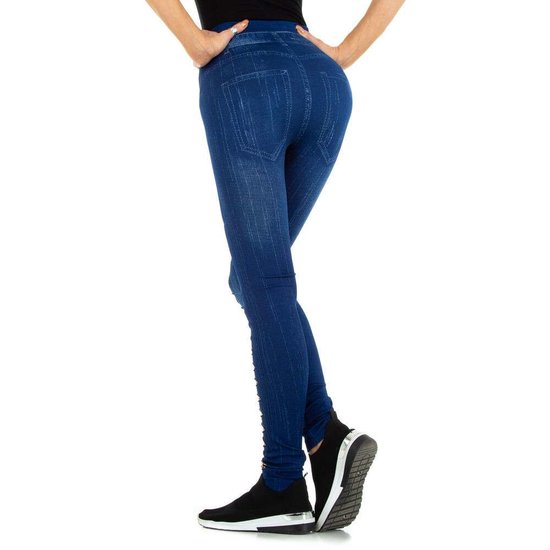 Blauwe-beige legging in jeans destroyed look.