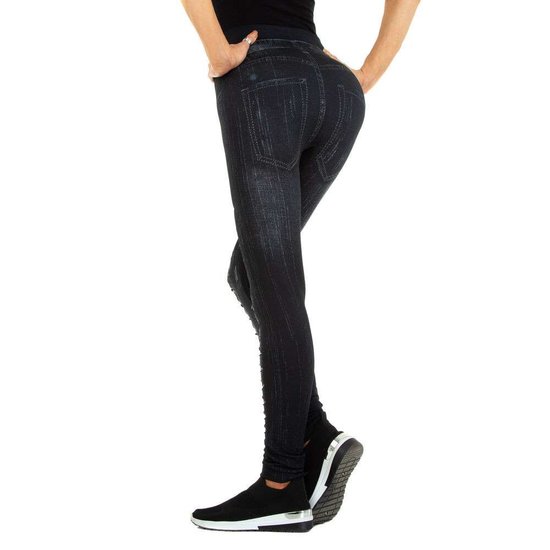 Zwarte-bruine legging in jeans destroyed look.