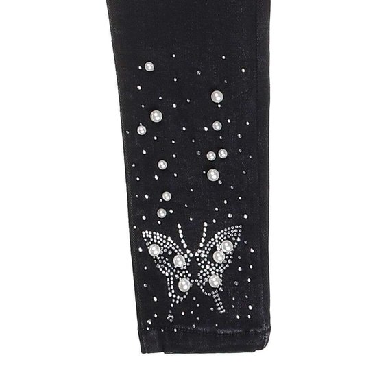 Meisjes zwarte jeans met vlinder.