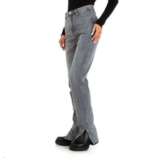 Grijze bootcut jeans.