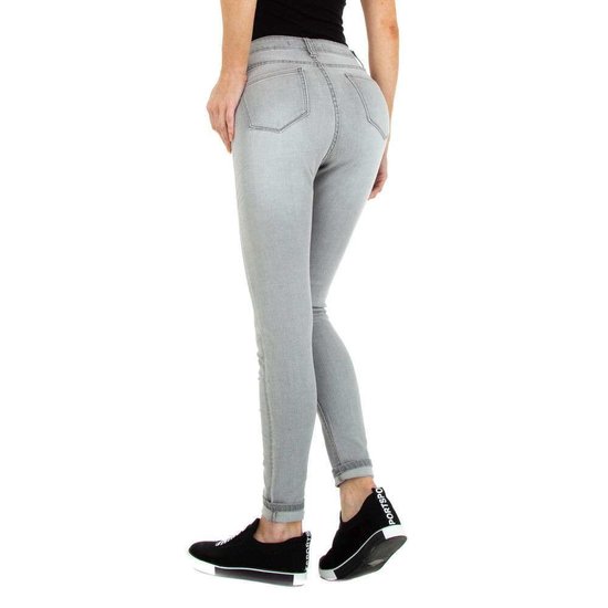 Licht grijze skinny jeans.