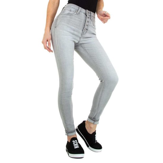 Licht grijze skinny jeans.