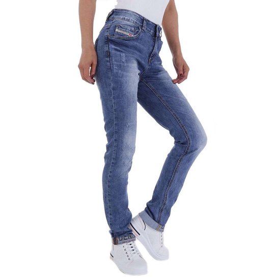 Trendy destroyed skinny jeans.