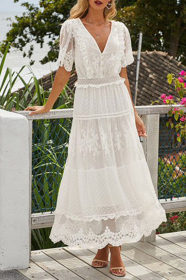 Elegante witte kanten 3/4 jurk.