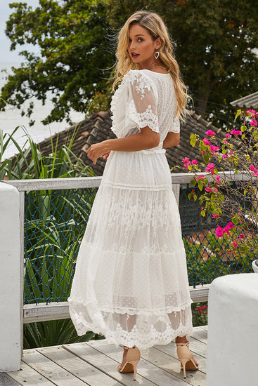 Elegante witte kanten 3/4 jurk.
