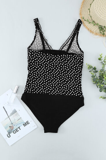 Maillot de bain noir à pois.