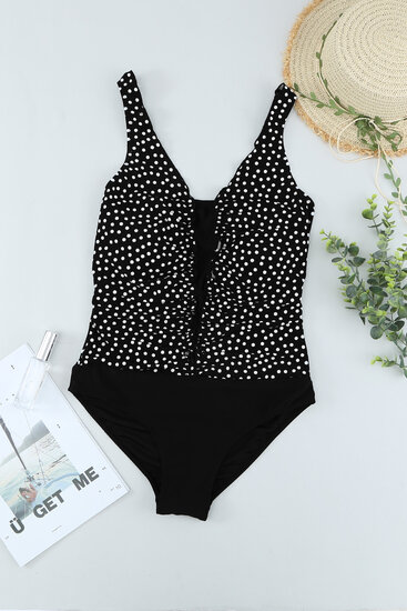 Maillot de bain noir à pois.