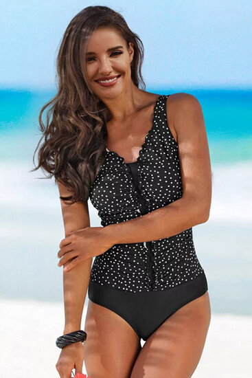 Maillot de bain noir à pois.