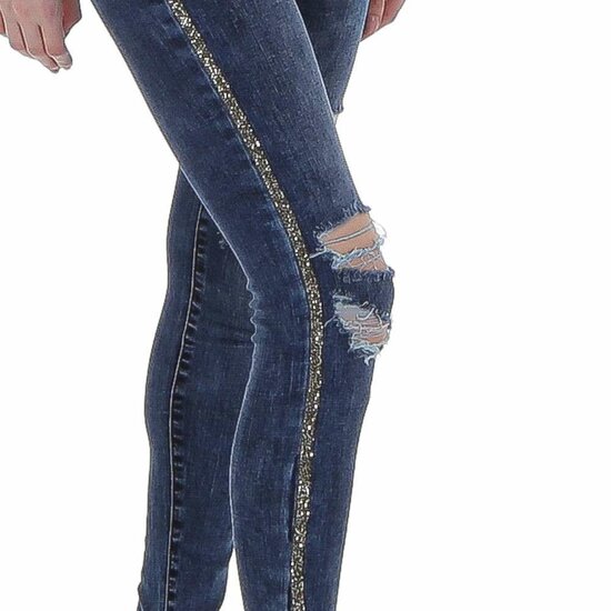 Blauwe destroyed jeans met strass.