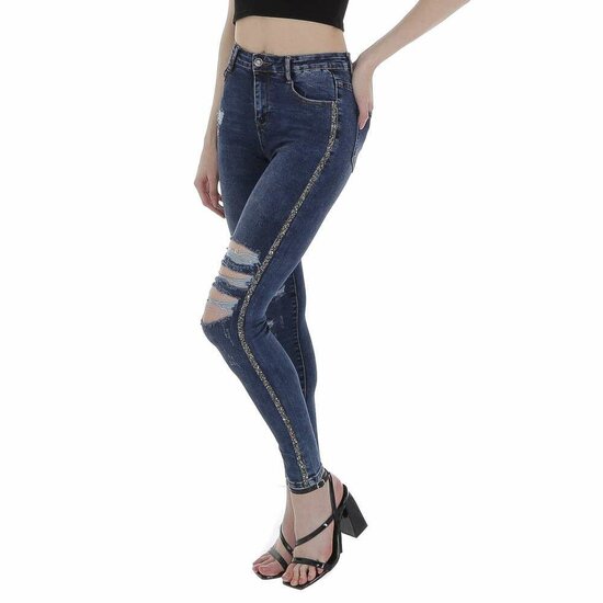 Blauwe destroyed jeans met strass.