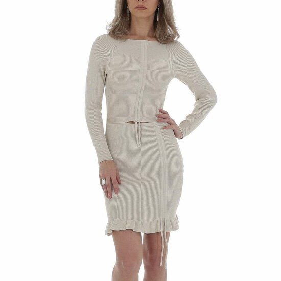 Beige midi cut out jurk in maille.