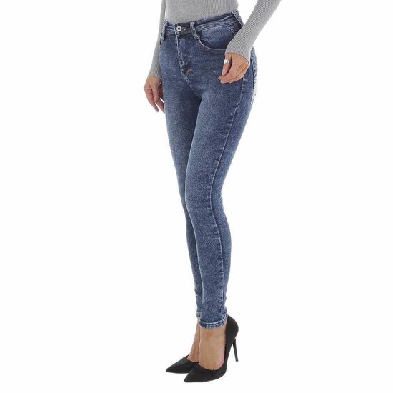 Skinny blue jeans broek met beer deco met wings.